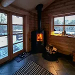 Round Timber House In Forest Near Mariager *