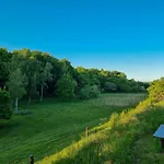 Round Timber House In Forest Near Mariager