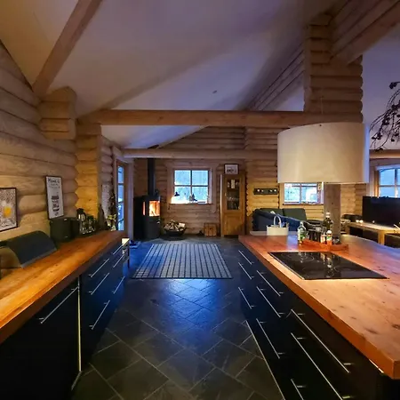 Round Timber House In Forest Near Mariager