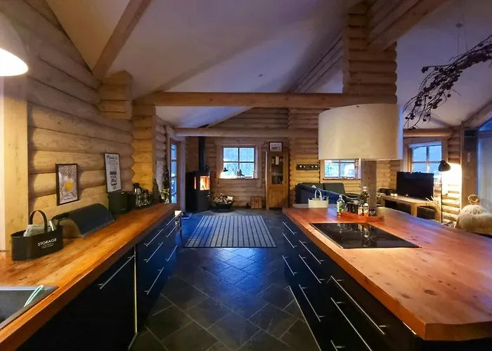 Round Timber House In Forest Near Mariager